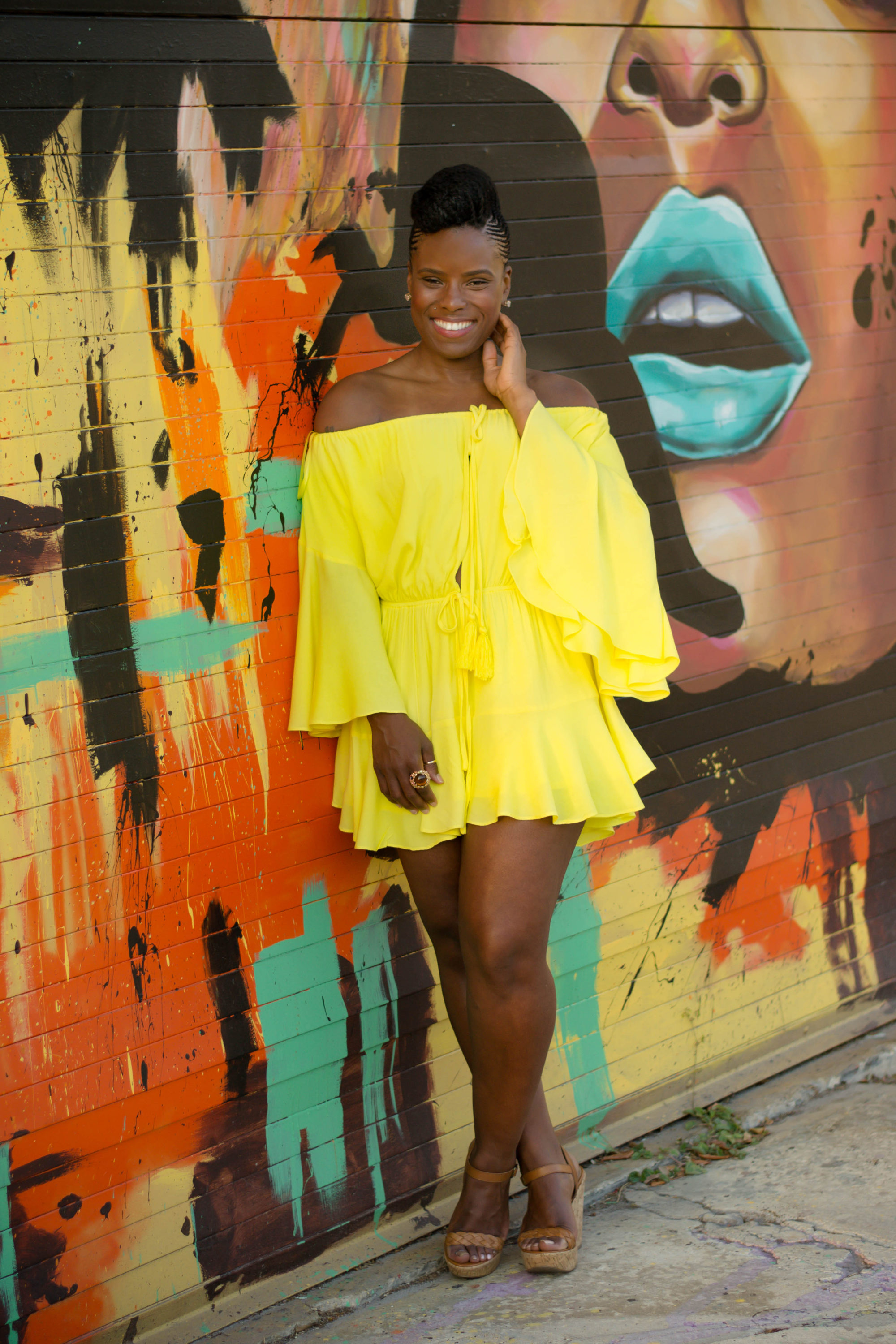 yellow romper and 4c braided updo